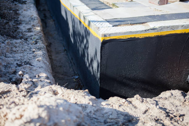 Professional Emergency Waterproofing technician working in Ooltewah, TN